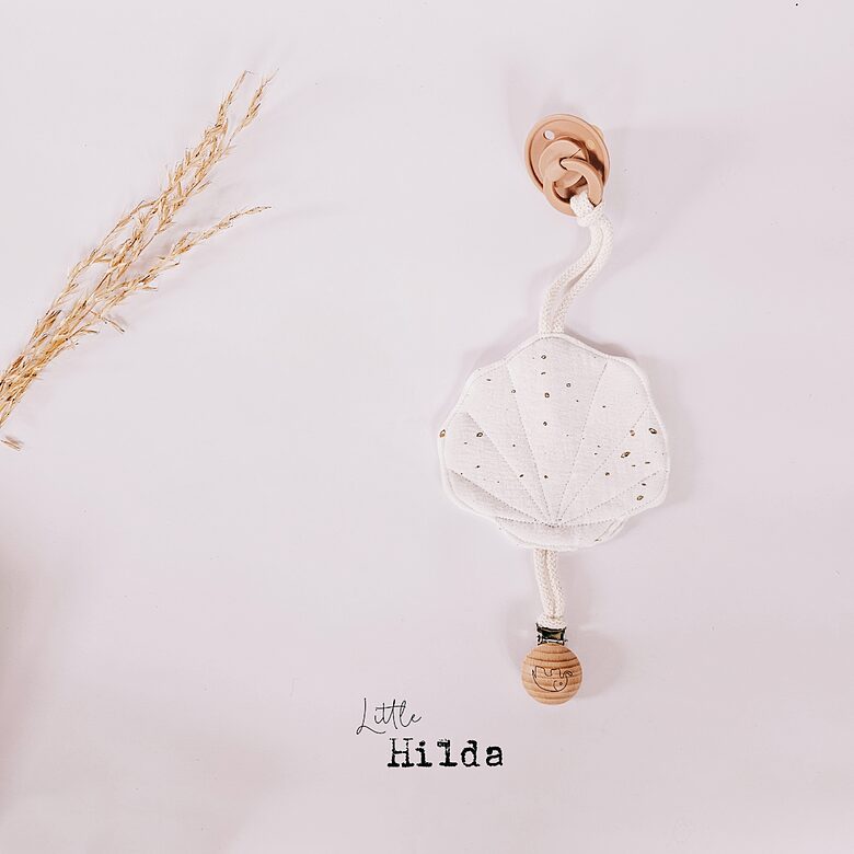 Muslīna knupīšu turētājs - gliemežvāks